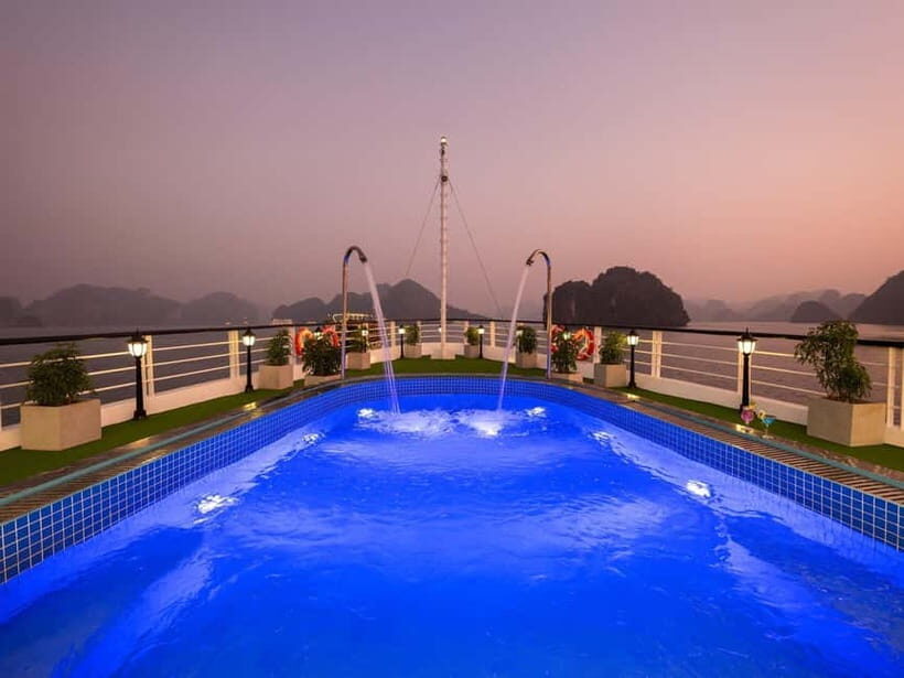 2-Day or 3-Day: Halong&Lan Ha Bay Cruise 5<em> balcony,bathtub – Dark & Bright Cave: Bamboo Boats and Kayaks Up Close’ /><br />
Day 3 is the limestone payoff. You get an early Taichi lesson on the sundeck, then breakfast while cruising through dramatic limestone islets as you head to Dark & Bright Cave.</p>
<p><p>The cave experience offers two ways to do it:</p>
</p>
<ul>
<li>Explore by kayak on your own</li>
<li>Or take a <strong>bamboo boat</strong> rowed by locals</li>
</ul>
<p><p>Both options change the experience. Kayak time gives you control and often more quiet moments as you work through the water and rock. The bamboo boat option leans into local guiding and a smoother ride through narrow sections.</p>
</p>
<p><p>This is also where the 2-day vs 3-day choice becomes clear. In the 2-day version, you skip Viet Hai Village and go straight to the cave on your second day. If you want both Lan Ha village life and the cave, choose 3 days. If your priority is classic Halong-Lan Ha highlights with less time on land, 2 days works.</p>
</p>
<p><p>After the cave time, you head back to the cruise, check out, and have lunch onboard. Then you leave the ship and return toward Tuan Chau pier, with car transfer back to Hanoi. The last stretch usually means you’ll arrive back in the Old Quarter around mid-afternoon.</p>
</p>
<h2 id="price-and-value-at-around-148-what-youre-really-paying-for">Price and Value at Around $148: What You’re Really Paying For</h2>
<p><img src=