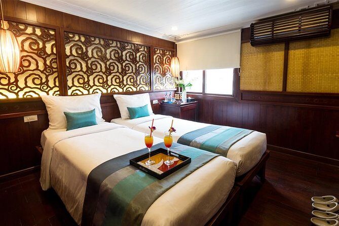 All inclusive Bhaya 2-Day Halong Bay Tour - Day 2: Tai Chi on Deck, Sung Sot Cave, and a Brunch Cruise Through Mist