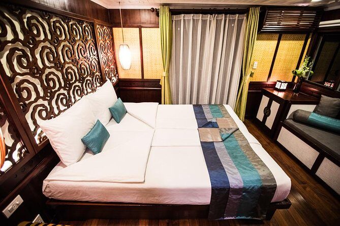 All inclusive Bhaya 2-Day Halong Bay Tour - Day 1: Trinh Nu Cave, Cooking Class Dinner, and Optional Squid Fishing
