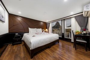 Featured: All-Inclusive OVERNIGHT Halong Cruises - many options - Day 1: Hanoi pickup, dock check-in, then Titop or Lan Ha pacing