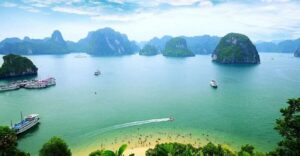 From Hanoi: 2-Day Ha Long Bay Tour with Ninh Binh and Cruise - Day 1 on Ha Long Bay: Sung Sot, Titop, Luon kayaking, and sunset on board