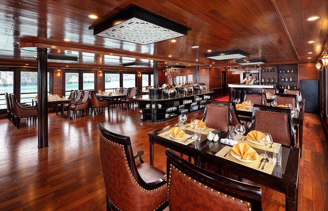Luxury 4<em> Cruise 2Days 1night Ha Long Bay – V'spirit Premier Cruise – V’Spirit Premier: a luxury ship that fits Lan Ha Bay’ /><br />
This cruise is positioned as a new luxury option on Lan Ha Bay, and the ship design is meant to feel distinctly Vietnamese rather than generic “cruise ship sleek.” You’re looking at a <strong>3-deck</strong> layout with an oriental tone, traditional decorative details, and a focus on quality materials. In plain terms, that means the ship feels like part of the trip—not just the transport between activities.</p>
<p><p>You’ll also appreciate the practical side of that “new luxury” approach. The cabins are well-furnished, and you get a <strong>private balcony</strong> in every cabin. On a 2-day itinerary, that little space matters. It’s where you can wake up, step outside for the morning air, and watch limestone shapes drift past without asking staff for a better view spot.</p>
</p>
<p><p>And yes, WiFi is included onboard, which can be handy if you want to send photos while they’re still fresh in your phone. It won’t replace going outside, but it’s a nice “modern life” touch on a traditional-water journey.</p>
</p>
<h2>Price and what you’re actually buying for $225</h2>
<p> Cruise 2Days 1night Ha Long Bay – V'spirit Premier Cruise – Price and what you’re actually buying for $225′ /><br />
At <strong>$225 per person</strong>, this cruise sits in the midrange for a 2-day, 1-night Lan Ha Bay experience with transfers and multiple included activities. The value comes from stacking several costs you’d otherwise pay separately: round-trip <strong>luxury limousine transfers</strong>, the <strong>sailing day with meals</strong>, entrance fees, kayaking, and extra onboard experiences like Tai Chi and a cooking demo.</p>
<p><p>Also, the itinerary includes enough structured time that you’re not constantly figuring out how to fill the gaps. You’re given a clear flow: caves and sampans in the afternoon, a sunrise start the next morning, kayaking in a specific area, then food and back to Hanoi.</p>
</p>
<p><p>The main reason this price can work for you is that it feels “complete.” You’re not paying just for a boat. You’re paying for a plan that covers the scenery, the water activities, and the food in between—while still leaving breathing room to enjoy the views from the ship.</p>
</p>
<h2>Getting from Hanoi: luxury limousine round-trip is the real convenience</h2>
<p><img width="669" height="446" decoding="async" src=