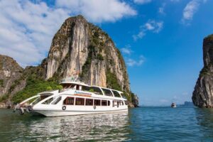 Luxury Halong Bay 1 Day on Cruises From Hanoi with Bus & Lunch - Boarding in Tuan Chau: welcome drink, safety, and then the water